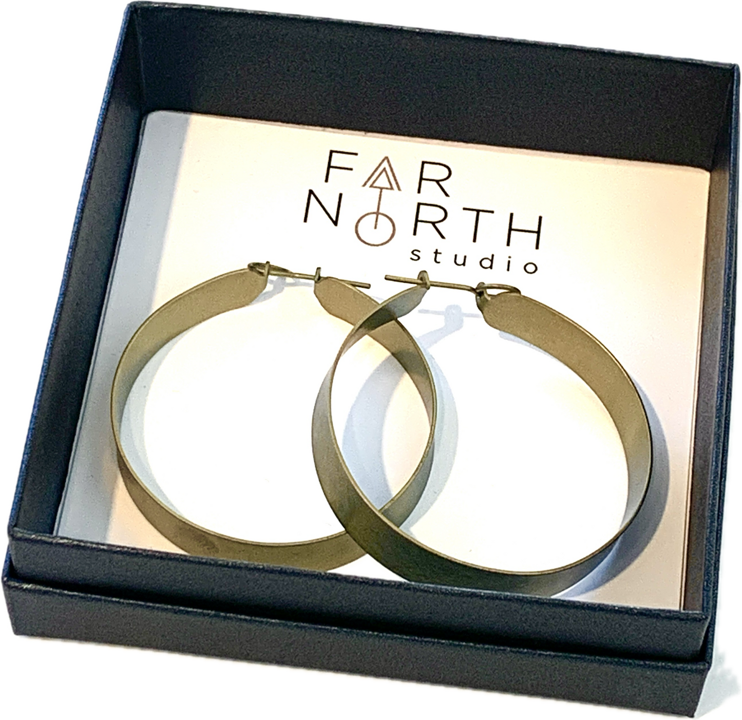 FAR NORTH STUDIO | ‘Hoop earrings’ | Pale Gold | Titanium