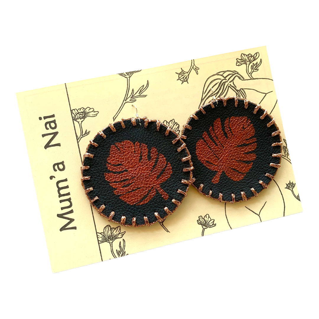 MUM’A NAI | ‘Maxi Attraction – Tropics #1’’ | Upcycled denim / acrylic on black leather with sparkle copper embroidery / sterling silver hooks | 8 (d) cm