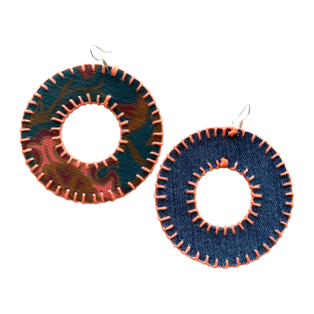 MUM’A NAI | ‘Dazzling Donuts – Romance Me #2’ | Upcycled denim / acrylic on canvas / pink cotton embroidery / sterling silver hooks | 7 (d) cm