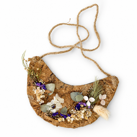 KERRY KLIMM | 'Defenders II' | 2026 | Paperbark on recycled plastic / thick felt backing / dried flowers and shells | Matrix: 135 x 185 x mm