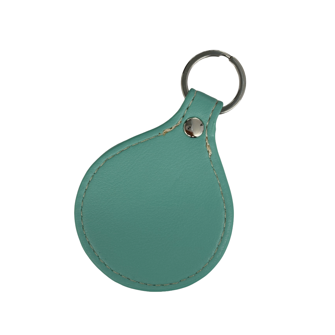 GIRRINGUN ART CENTRE |'Bagu Face Keyring' | Turquoise leather