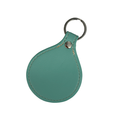 GIRRINGUN ART CENTRE |'Bagu Face Keyring' | Turquoise leather