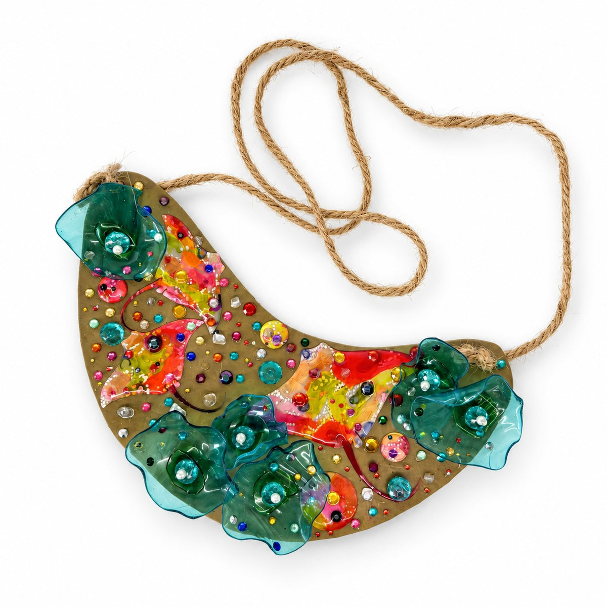 KERRY KLIMM | 'Worth less, worthless I' | 2026 | Olive oil bottle plastic lids / jewels / acetate / alcohol ink | 145 x 205 x mm