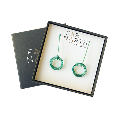 FAR NORTH STUDIO | ‘Orbit earrings (small) – Sage green' | Titanium