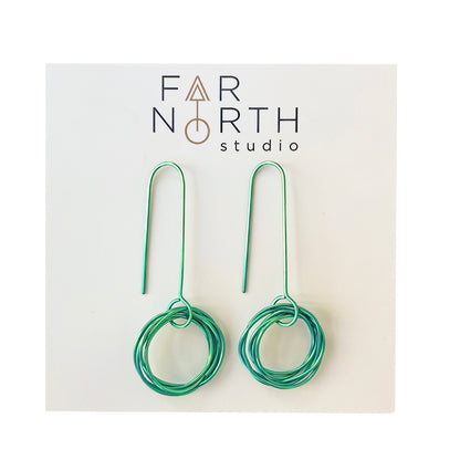 FAR NORTH STUDIO | ‘Orbit earrings (small) – Sage green' | Titanium