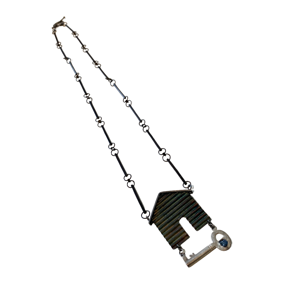ALISON McDONALD | ‘Belonging Latch Key Necklace’ | Corrugated sterling silver pendant and chain | rough sapphire / liver of sulphur patina
