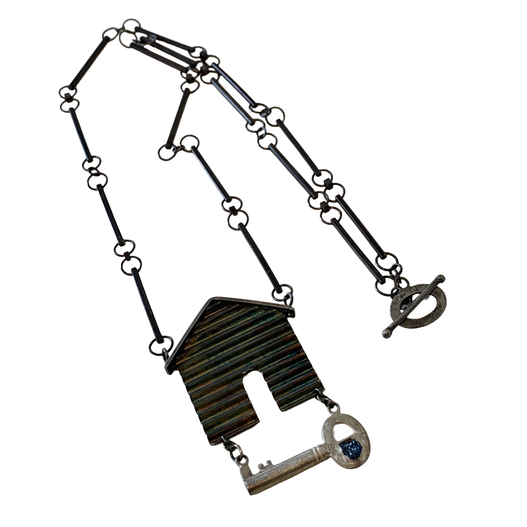 ALISON McDONALD | ‘Belonging Latch Key Necklace’ | Corrugated sterling silver pendant and chain | rough sapphire / liver of sulphur patina