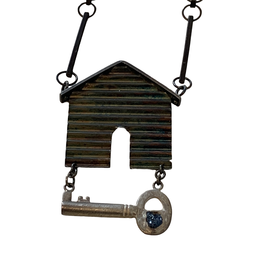 ALISON McDONALD | ‘Belonging Latch Key Necklace’ | Corrugated sterling silver pendant and chain | rough sapphire / liver of sulphur patina