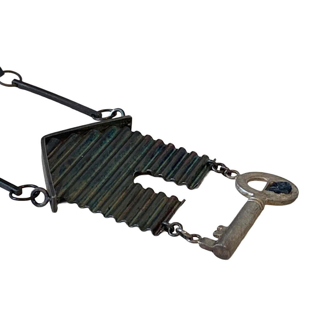 ALISON McDONALD | ‘Belonging Latch Key Necklace’ | Corrugated sterling silver pendant and chain | rough sapphire / liver of sulphur patina