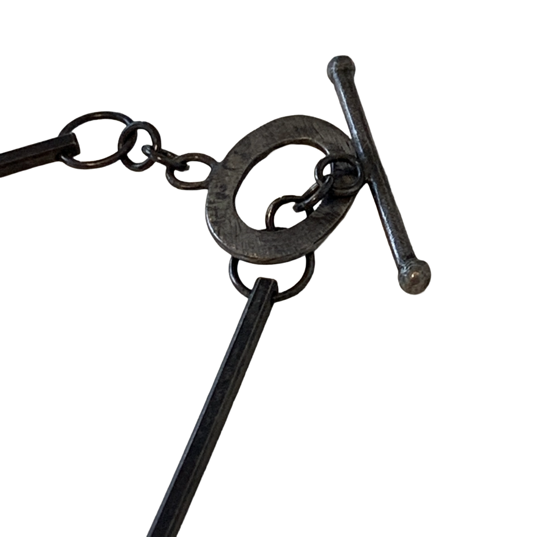 ALISON McDONALD | ‘Belonging Latch Key Necklace’ | Corrugated sterling silver pendant and chain | rough sapphire / liver of sulphur patina