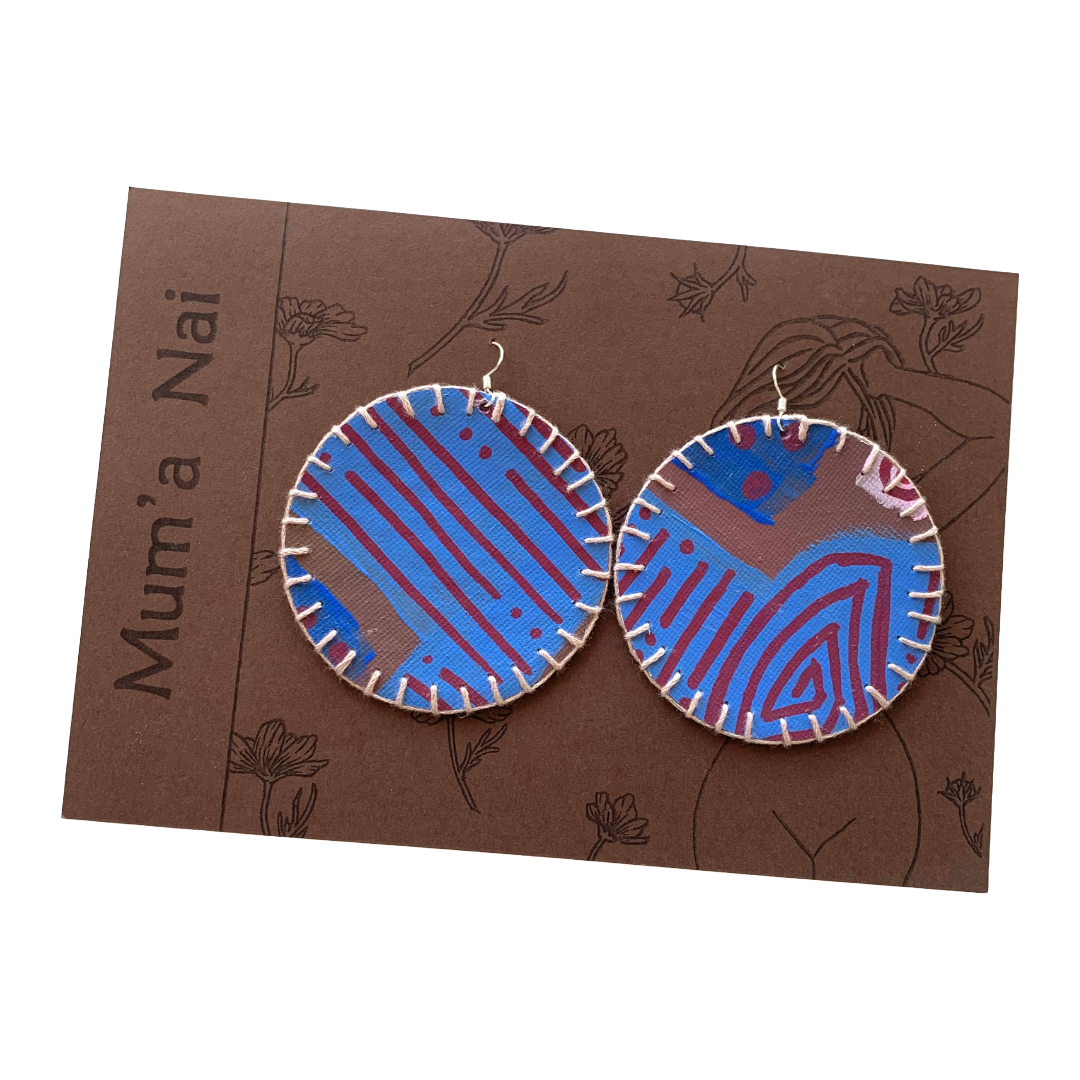 MUM’A NAI | ‘Colossal Charms – Tribal Love #2’ | Upcycled blue cotton material / acrylic on canvas / grey cotton embroidery / sterling silver hooks | 7 (d) cm