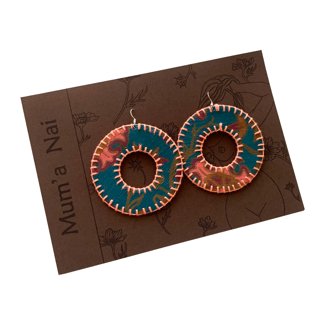 MUM’A NAI | ‘Dazzling Donuts – Romance Me #2’ | Upcycled denim / acrylic on canvas / pink cotton embroidery / sterling silver hooks | 7 (d) cm