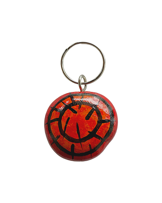 SHERYL J BURCHILL | ‘Rainforest or Sea’ | Burnie bean keyring / hand painted | Red / black / orange