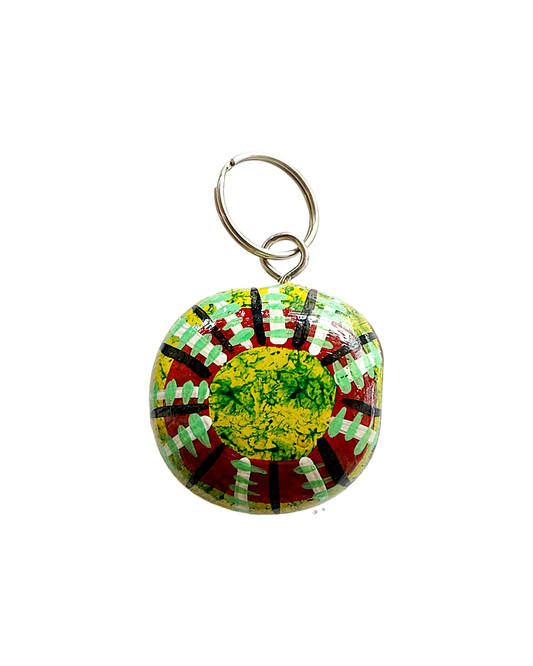 SHERYL J BURCHILL | ‘Rainforest or Sea’ | Burnie bean keyring / hand painted | Green / red / white / black / yellow